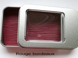 Small metal box coloured leather bordeaux